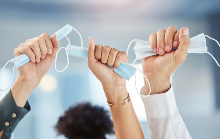 Covid freedom, hands and taking off face mask in success, support and community post lockdown in gl